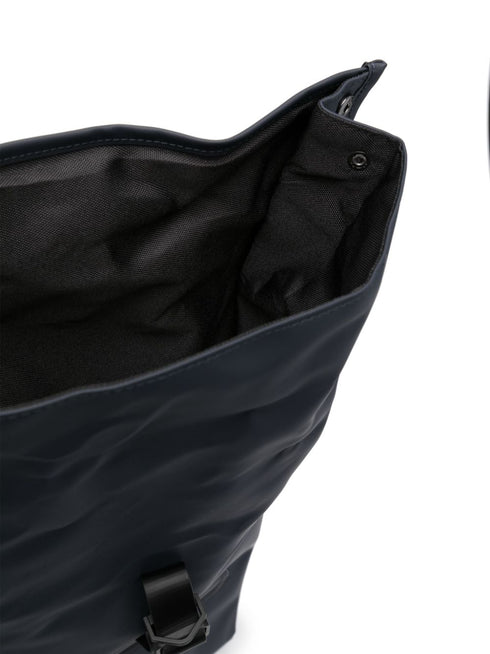 roll-top buckled backpack