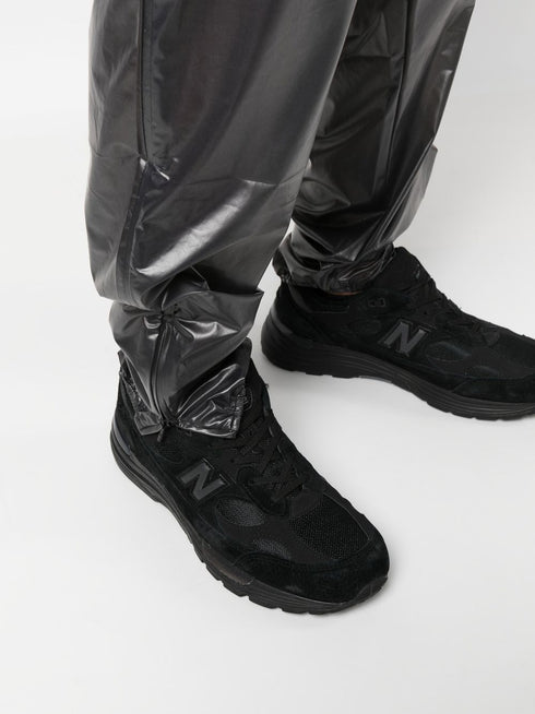 elasticated-waist waterproof trousers
