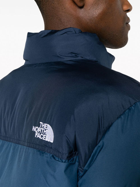 Saikuru logo-embroidered quilted jacket