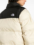 Saikuru logo-embroidered quilted jacket