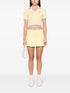 plisowana minispódniczka z haftowanym logo