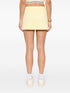 plisowana minispódniczka z haftowanym logo