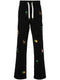 motif-embroidered cotton track pants