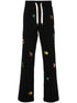 motif-embroidered cotton track pants