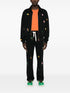 motif-embroidered cotton track pants