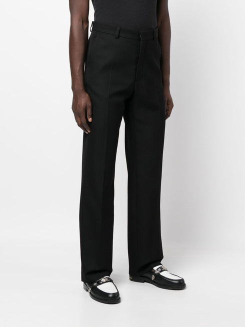 flared-leg design trousers