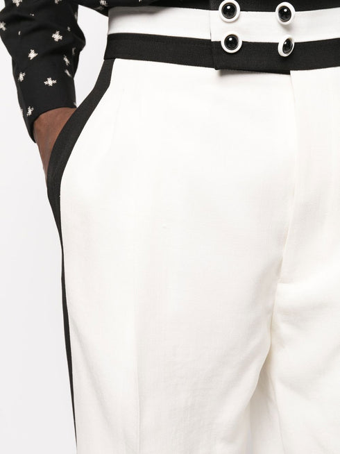 spodnie z szerokimi nogawkami i detalami w paski