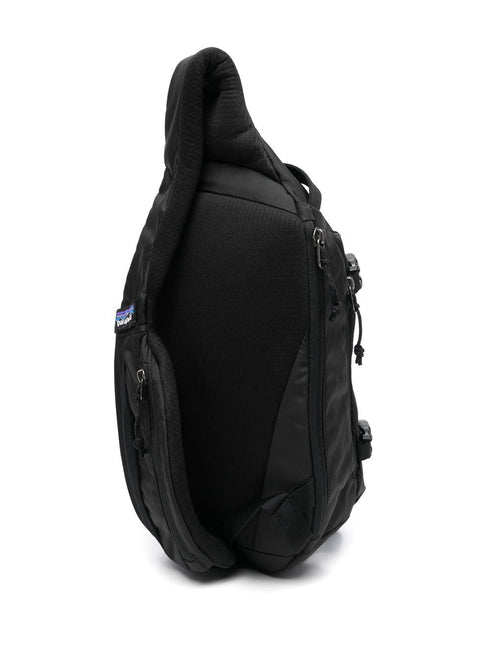Atom logo-print sling backpack